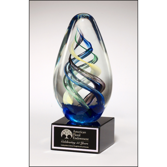 Egg-shaped art glass award on black glass base