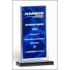 Clear acrylic award with dark blue draped satin pattern and silver mirror border on a black acrylic base with blue mirror top