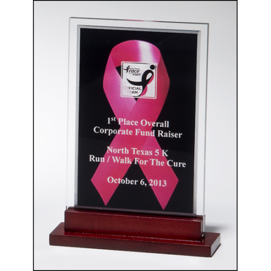 Breast cancer awareness acrylic. Pink ribbon against a black background with a mirror silver border Breast cancer awareness acrylic. Pink ribbon against a black background with a mirror silver border