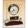 Beveled glass desktop clock, rosewood piano-finish base with gold metal accents