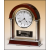 Mantle clock with rosewood piano-finish wood, chrome-plated posts and brushed silver aluminum accents