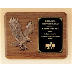 American walnut plaque with a sculptured relief eagle casting