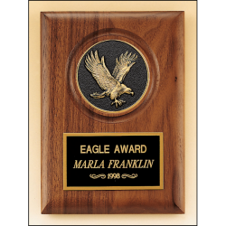 American walnut plaque with a finely detailed black and gold eagle medallion